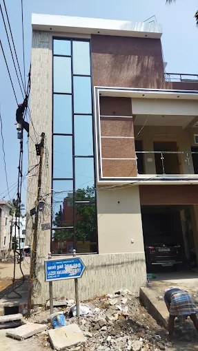 Aluminium glass facade fabrication on a multi-storey building in Chennai