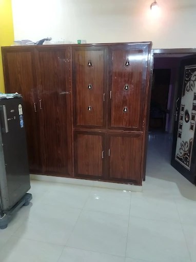 Premium plywood wardrobe furniture installed in a bedroom