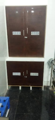 Dark maroon double-door PVC cupboard installation